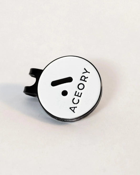 Angled view of the Aceory magnetic ball marker highlighting the clean white finish.